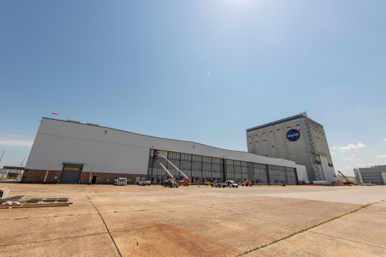 Employees wear personal protective gear at  Michoud Assembly Facility as the facility transitioned to Stage 3 of NASA’s Framework for Return To On-Site Work. Employees wear the appropriate personal protective equipment (PPE) and/or cloth face coverings as required for assigned tasks. Access to the facility is limited to authorized personnel working on mission-critical tasks that must be conducted onsite. Mission-critical tasks include slowly and methodically resuming Space Launch System (SLS) Core Stage and Orion production activities, particularly critical path deliverables to support the Artemis Program, at a pace that limits personnel and follows federal guidelines for social distancing and use of personal protective equipment such as face masks. For more information about SLS, visit nasa.gov/sls.